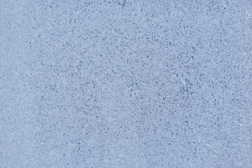 Frost patterns on frozen glass on a winter day. Winter frosty texture natural background