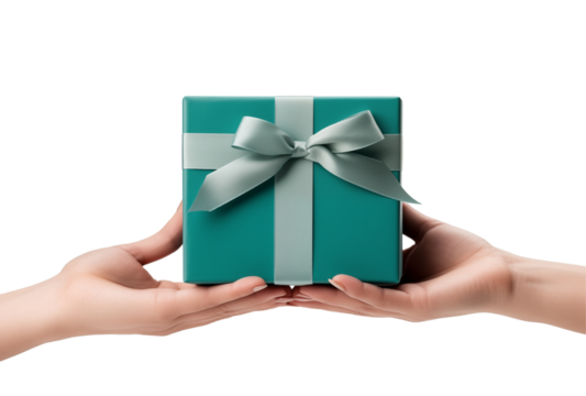 Hands Holding A Green Gift Box With Ribbon And Bow On A White Background