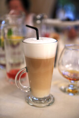 Cup of latte coffee with latte art.