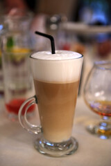 Cup of latte coffee with latte art.