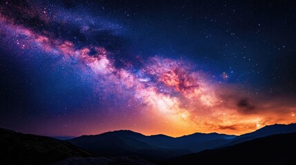 Colorful galaxy in the sky above hills