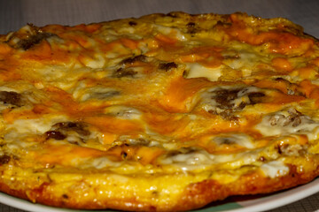 Omelette with meat and cheese for breakfast