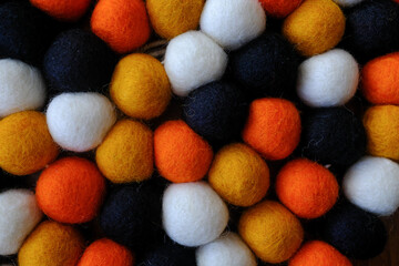 Closeup of Textured Halloween Felt Balls on String