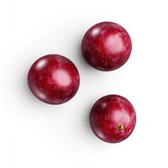 Obraz premium Three shiny red fruits arranged on a white background.
