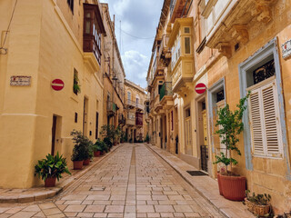 Traditional tiny Maltese street in Birgu, The Three Cities, Malta