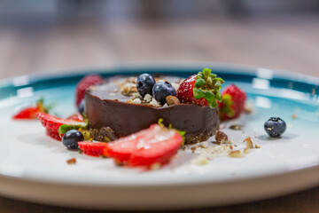 a plate of beautiful looking delicious dessert. 