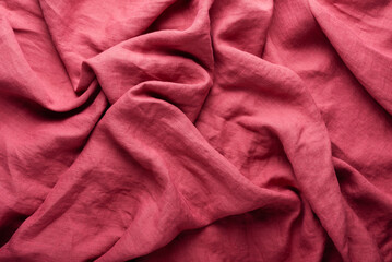 Fototapeta premium stonewashed linen fabric in dark pink color