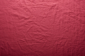 stonewashed linen fabric in dark pink color