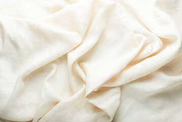 stonewashed linen fabric in dark cream color