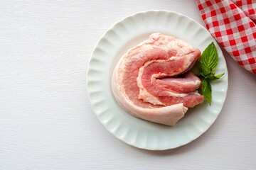 fresh pork belly on white background, raw pork belly