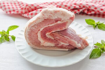 fresh pork belly on white background, raw pork belly