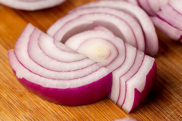 preparing red onions for cooking in dishes