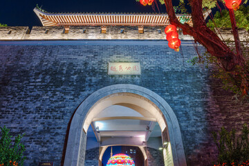 Traditional Chinese architectural city wall at the gate of the city park