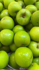 Apples,Plum, peach fruits for sale in the market.A bunch of fresh and ripe fruits are for sale .Fruits stall at fruit market.Fruits backgrounds