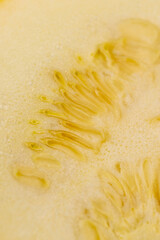 cut yellow ripe pumpkins on the table in close-up