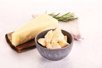 Chopped Italian hard parmesan cheese