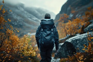 Person Hiking. Adventure Man Traveling in Scandinavian Mountains for Active Healthy Lifestyle