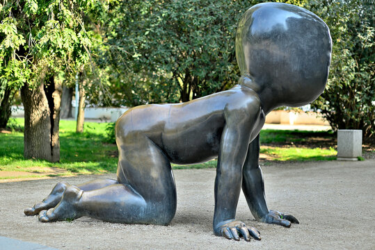 The Babies at Kampa park museum, bronze sculptures of crawling babies with mutant faces by controversial Czech artist David Cerny, in Prague, Czech Republic on 17 July 2024