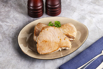 Roasted red tuna steak in the plate