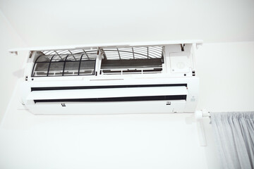 Cleaning and maintaining air condition unit at home.