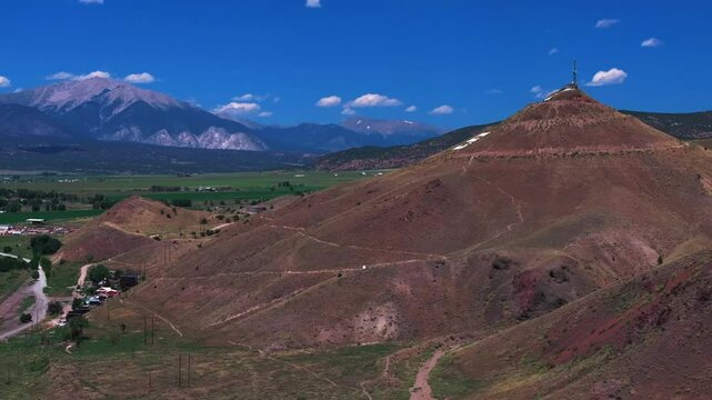 Collegiate Peaks 14ers S Mountain Tenderfoot Hill Salida Colorado aerial drone parallax right circle motion Buena Vista Rocky mountain town Chaffee County USA Arkansas River blue sky sunny daytime