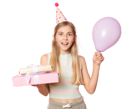 Happy cheerful little girl in birthday hat showing gift boxes isolated over transparent background