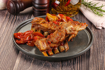 Baked lamb ribs with vegetables