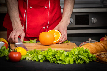 person cutting vegetables
