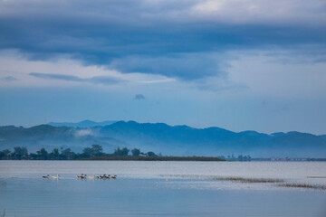 Poetic sunrise scenery on Lak lake, Lak District, Dak Lak Province, Vietnam