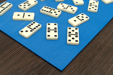 Dominoes bones on blue background	