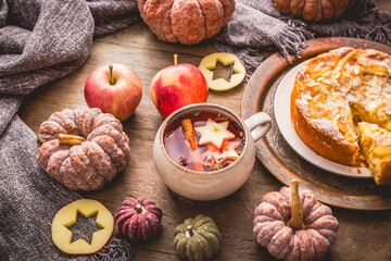 Homemade apple pie with fruit tea for cold autumn days and Thanksgiving