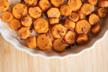 Delicious Garlic Butter Parmesan Carrots in a White Tray Ready to Eat – The Perfect Holiday Side Dish Close-Up
