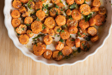 Delicious Garlic Butter Parmesan Carrots in a White Tray Ready to Eat – The Perfect Holiday Side Dish Close-Up