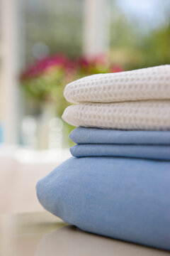 Close up of a stack of bed linen
