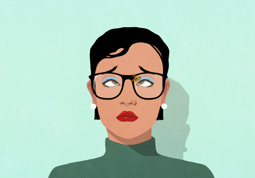 Cross-eyed woman watching bumble bee on eyeglasses
