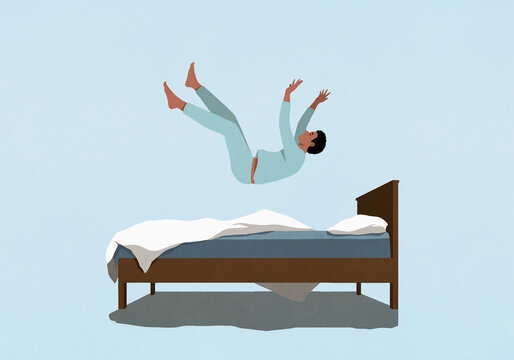 Man in pajamas falling on bed
