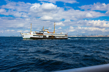 Ferry and cityscape of Istanbul on the background