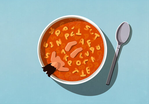 Man soaking in large bowl of alphabet soup
