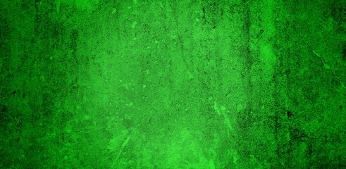 Obraz premium the long wall background is green, blank uncoated canvas or scrim for background long and wide panoramic banner background from rough linen dark green cloth or burlap