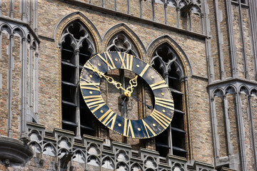 Clock on south facing tower of the Cloth Hall of Ypres, Belgium.