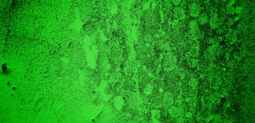 the long wall background is green, blank uncoated canvas or scrim for background long and wide panoramic banner background from rough linen dark green cloth or burlap