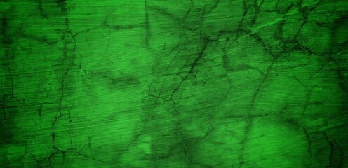 the long wall background is green, blank uncoated canvas or scrim for background long and wide panoramic banner background from rough linen dark green cloth or burlap