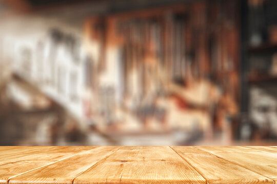 Craft workshop interior and empty work table with space for products.