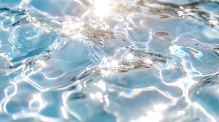 A close-up of shimmering water, highlighting light reflections and ripples, creating a serene and tranquil atmosphere.