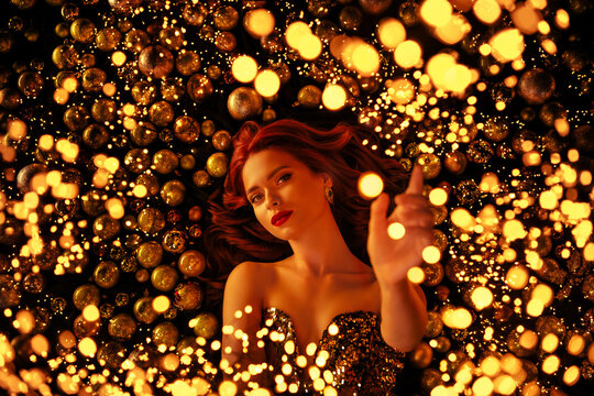 High angle photography of stunning rich classy lady lying on shiny decorations background posing studio photo set