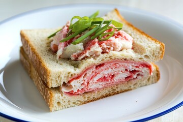 a piece of snack sandwich stuffed with crab meat in a plate