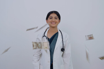 Indian Female Doctor Throwing Money in Air