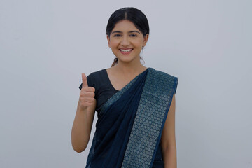 Indian Woman in Saree Showing Thumbs Up