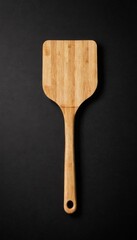 wooden pizza spatula isolated on black, generative ai
