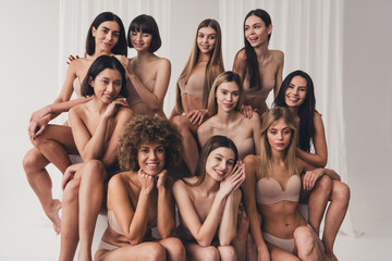 Obraz premium Photo of group women in studio advertising new brand basic underwear for body positive girls isolated at white studio